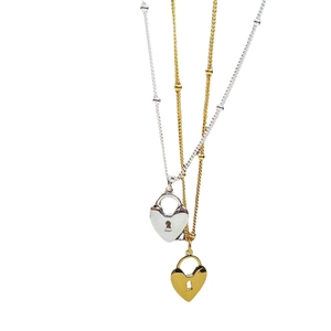Collier médaillon cœur minimaliste en argent sterling 925, finitions or et argent