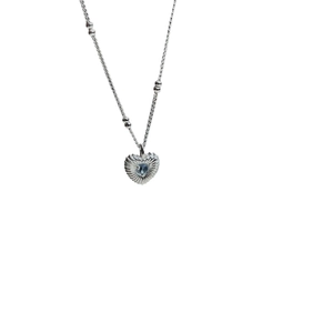 925 silver heart pendant necklace with light blue gem and textured vertical ribbing pattern