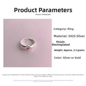 Detailed view of S925 silver heart ring with red gemstone and adjustable band