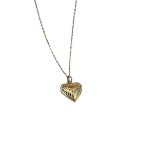 925 silver 18k gold heart pendant necklace with radial texture on a delicate O-chain