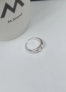 Detailed view of an adjustable S925 silver star ring featuring a pink zircon gemstone