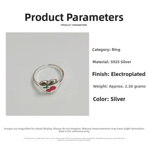 Detailed view of S925 sterling silver open ring with red cherry heart pattern