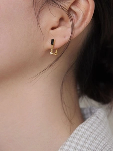 925 silver gold square black onyx earrings with zircon shown on ear in side view