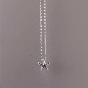 Polished 925 sterling silver starfish pendant necklace on thin cable chain for women