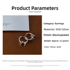 Detailed view of S925 sterling silver knot hoop earrings weighing 6.5g on leather