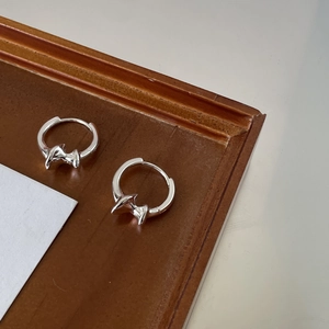 Elegant S925 sterling silver hoop earrings with irregular geometric starburst pendants