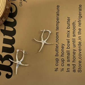 Polished S925 sterling silver starfish hoop earrings with high-shine metallic finish