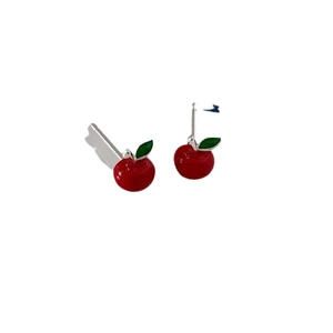 Cute 925 sterling silver red apple stud earrings with green leaf detail on white background