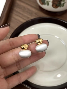 Minimalist gold and silver mixed-metal brushed finish double oval stud earrings