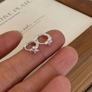 Elegant 925 sterling silver hoop earrings featuring small cross pendants for women