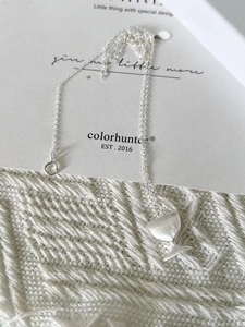 Macro shot of S925 sterling silver wine glass pendant necklace with fine matte finish