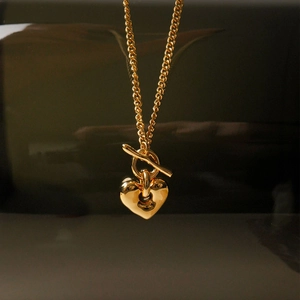 Collier minimaliste en argent 925 doré avec pendentif cœur et fermoir à bascule