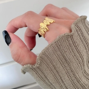 Minimalist irregular textured gold open ring for women with organic lava style surface