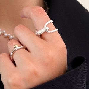 Minimalist 925 sterling silver geometric open rings with gold bead accent worn on finger