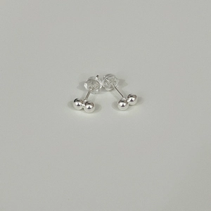 Minimalist 925 sterling silver bean stud earrings with high-polish finish and silicone backs
