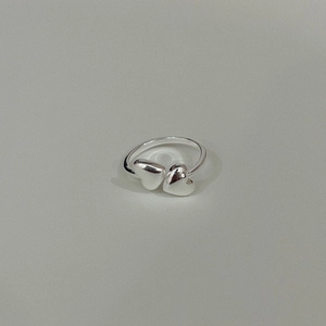 Minimalist 925 sterling silver open ring featuring a double heart crossover design