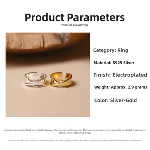 Detail view of gold and silver S925 sterling silver overlapping rings weighing 2.9g
