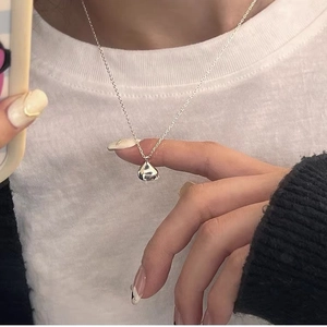 Minimalist sterling silver waterdrop pendant necklace for women on a fine link chain