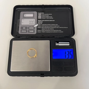 Detail showing the 925 sterling silver bow ring weighing 1.35g on a digital scale