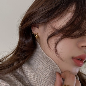 Minimalist S925 sterling silver gold earrings set shown on model with matching ring