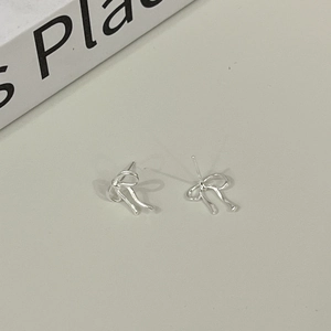 Minimalist silver bow knot stud earrings in a sleek twisted metal wire design