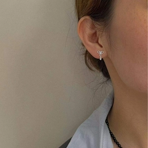 Élégantes boucles d'oreilles nœud en argent sterling S925 avec zircon brillant pour femme