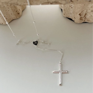 925 silver cross necklace with sparkling zircons and a black enamel heart charm