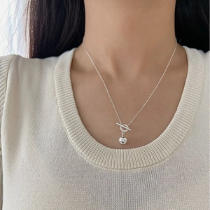Minimalist S925 sterling silver necklace with OT buckle and polished ball pendant on model