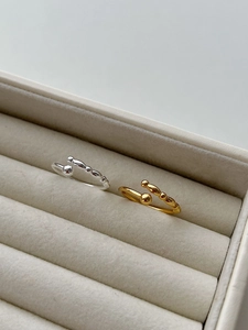 Detailed close-up showing S925 hallmark on gold and silver beaded adjustable open rings
