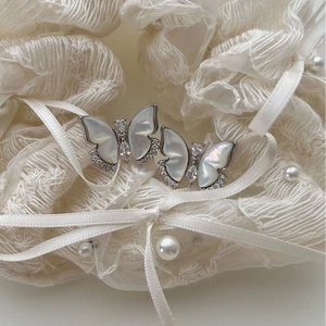 Boucles d'oreilles papillon exquises en argent 925 avec nacre blanche et zircons