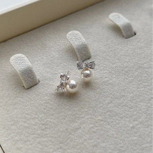 Elegant 925 sterling silver bow knot pearl stud earrings with sparkling pavé zircons
