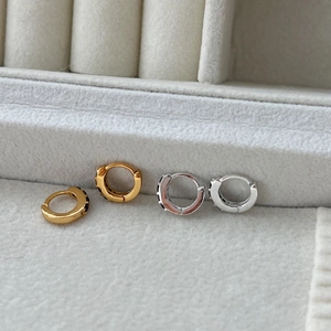 Minimalist S925 sterling silver hoop earrings with black micro-pave stones in a jewelry box