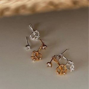 Boucles d'oreilles cœurs bretzels en argent 925 avec zircons cubiques en finitions or et argent