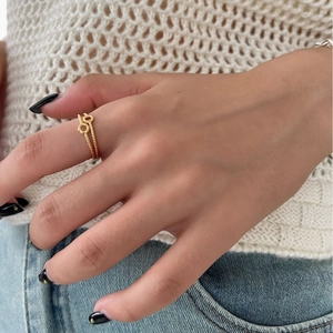 Minimalist S925 sterling silver double layer wave ring with golden finish on finger