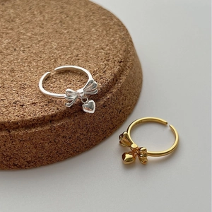 Minimalist S925 sterling silver bow ring with heart pendant in gold and silver finish