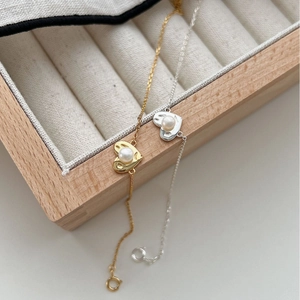 Elegant 925 silver adjustable heart and pearl bracelet in gold and silver finish