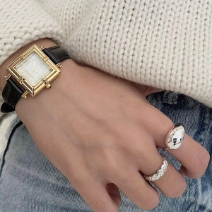 Minimalist 925 sterling silver teardrop ring set with vintage watch and knits