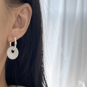 White agate donut earrings with silver bamboo style buckle and oriental jade charm