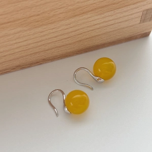925 silver drop earrings featuring elegant yellow agate beads on a white background