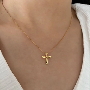 Minimalist S925 sterling silver cross pendant necklace in gold worn on female neck