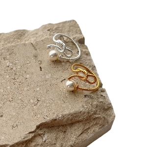 925 Sterling Silver rope knot rings with pearls in gold and silver finish on stone
