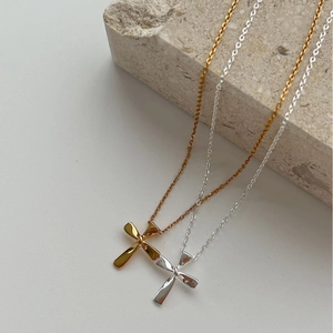 Elegant S925 sterling silver cross necklaces in gold and silver finish on stone