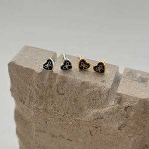 Exquisite 925 silver heart stud earrings with black enamel and bow detail on stone