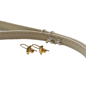 Elegant sterling silver polished X-shaped cross hook earrings in gold and silver finish
