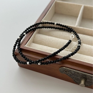 Double-layered S925 silver necklace with black faceted beads and metal tube accents