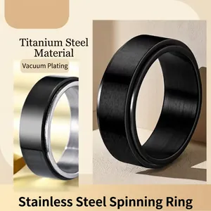 8mm spinner ring in black and silver stainless steel with brushed finish texture