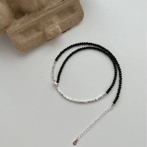 Minimalist S925 silver beaded necklace featuring black onyx stones and lobster clasp closure