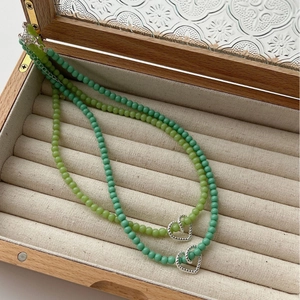 Green handmade 925 sterling silver beaded necklace with hollow heart pendant in box