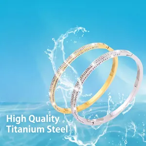 Waterproof stainless steel bangle set in gold and silver with sparkling crystals
