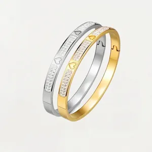Bracelet jonc cœur en acier inoxydable avec cristaux en finitions dorée et argentée